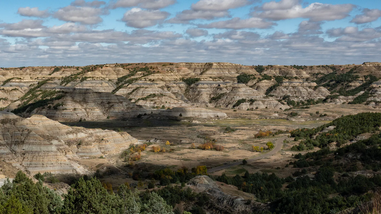 Sunlight crossing the valley in Theodore Roosevelt National Park